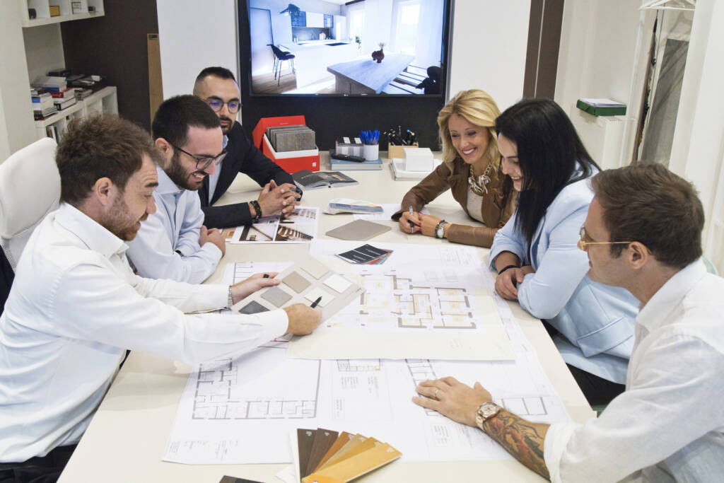 Foto del team rextaura che lavora ad un progetto